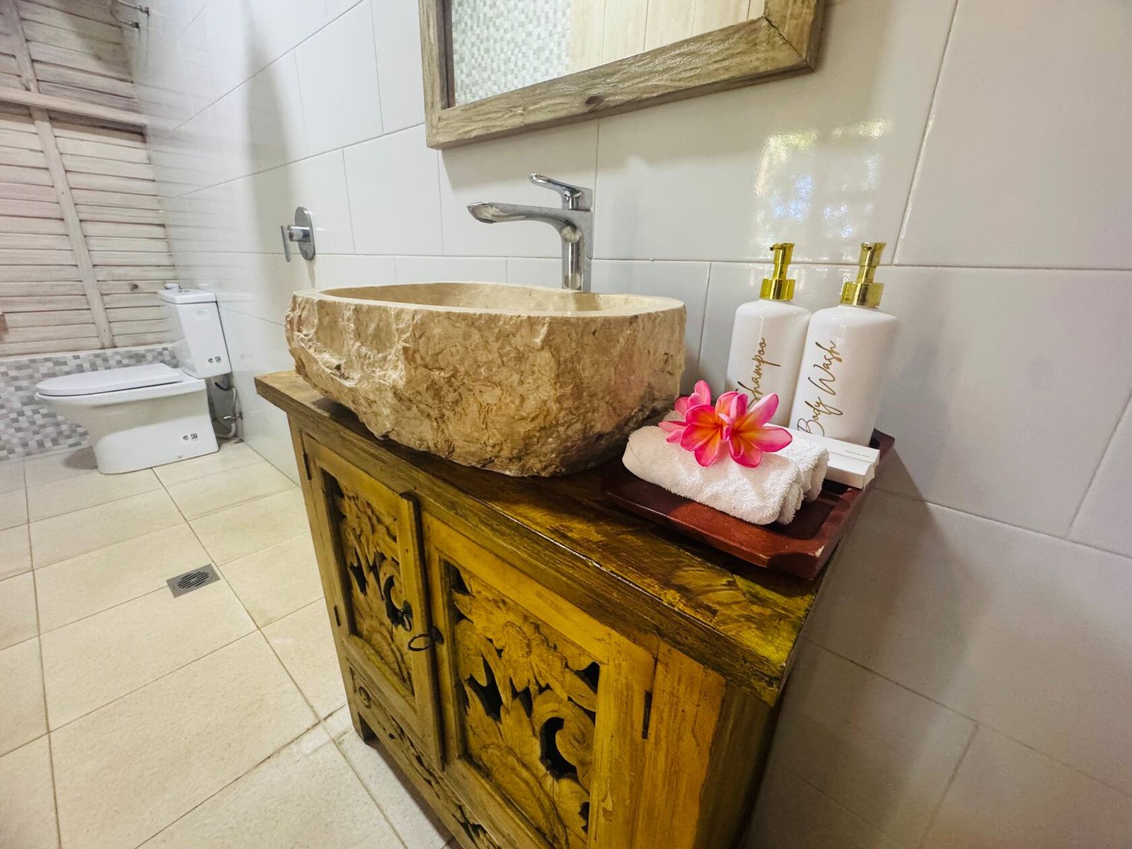 Bathroom with natural stone basin